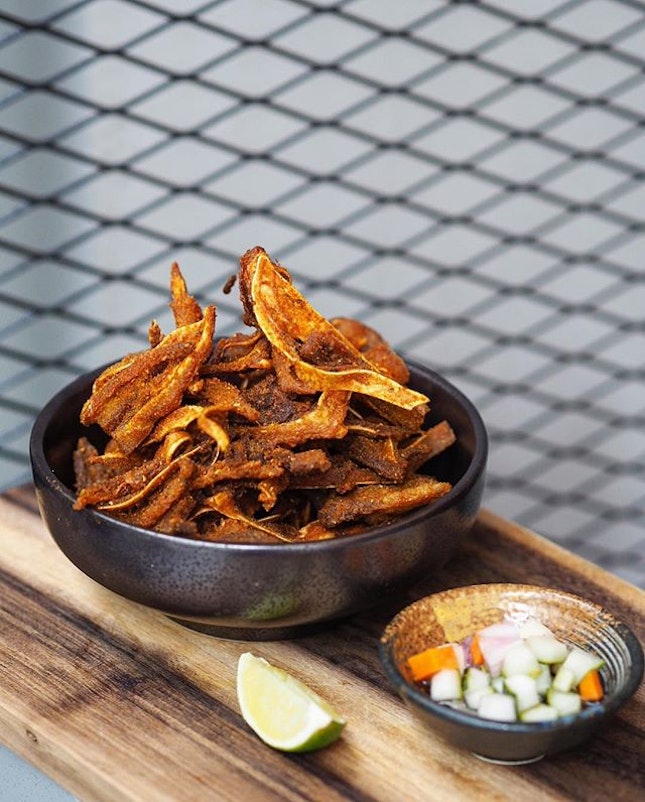[Fat Chap] - The Crispy Pig’s Ear ($12) is a crispy fried snack, coated with a special homemade curry powder mix.