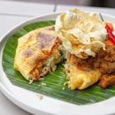 [Urbana Rooftop Bar] - The Pandan Nasi Lemak Omelet ($16) comes in a generous portion of pandan flavoured nasi lemak rice wrapped in a huge thin omelet, coated with chilli just below the omelet skin to give the dish a sharp kick of spice.