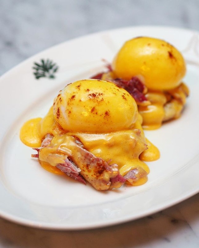 [The English House] - Classic Eggs Benedict ($20) with perfectly oozy golden egg yolk, slathered in a rich hollandaise sauce atop Wiltshire ham.