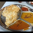 Roti Kosong with fish curry, dhal and sambal!