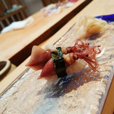 close up of a baby octopus nigiri by sushi mitsuya