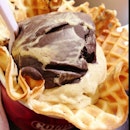 Dark Chocolate & Gingerbread Ice Cream In waffle bowl.