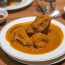 Chicken curry...tender meat that fall off the bones just with a slight pry, and packed with fragrant spices.