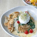 Everything I love about a pasta dish...blistered tomatoes, wilted spinach, poached egg + grilled chicken.
