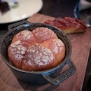 The tipsy cake — sugar-crusted and brandy-soaked brioche made-to-order — with the spit roast pineapple is probably my fave.