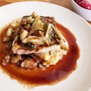 Roasted cod with crushed potatoes, artichoke, salted capers, red wine and lemon sauce (@breadstkitchen)